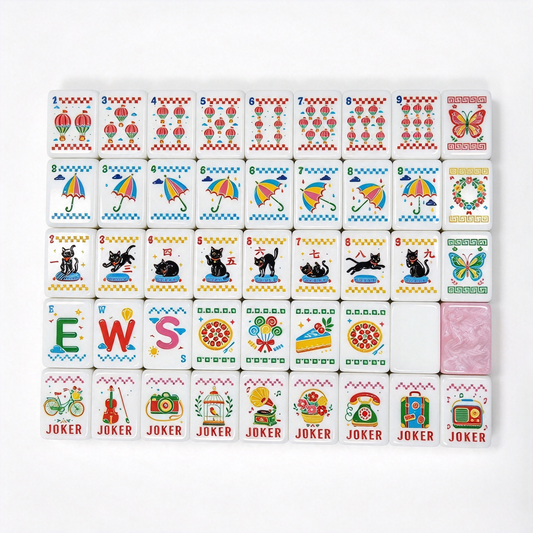 Full layout of Retro Nostalgia American mahjong tiles, ten vintage jokers in first column, N/E/S/W rainbow wind tiles, black cat cracks 1-9, umbrella bamboos 1-9, hot air balloon dots 1-9, butterfly and wreath flower tiles, pink pearlescent backs