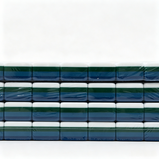 Side profile of 32g weighted teal Mahjong tiles with deep petrol backs from the USA Mahjong Co. American Mahjong Set.