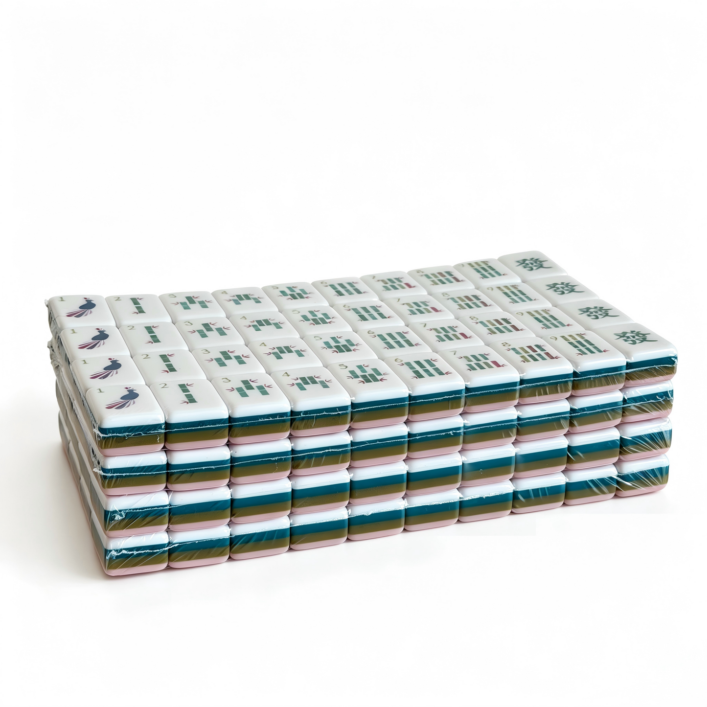 Side profile of Dusty Rose American Mahjong Set tiles by USA Mahjong Co., featuring 32g weighted tiles with blush backs and compass wind design.