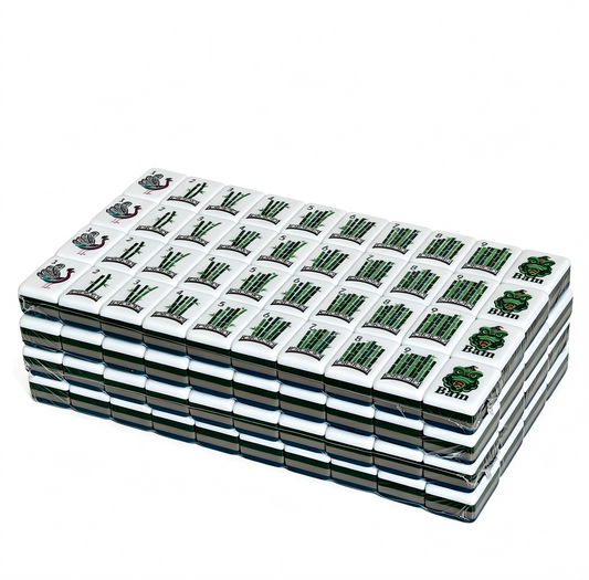 Side profile of 32g teal Zenith American Mahjong tiles with deep petrol blue backs and compass wind design, by USA Mahjong Co.