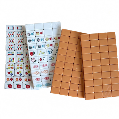 Artisan American Mahjong set with honey amber tiles, floral vase jokers, and warm caramel backs from USA Mahjong Co.