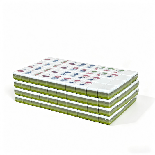 Side view of USA Mahjong Co. Apple Mint Parfait American Mahjong Set with 166 green gradient acrylic tiles and quad-layer design.