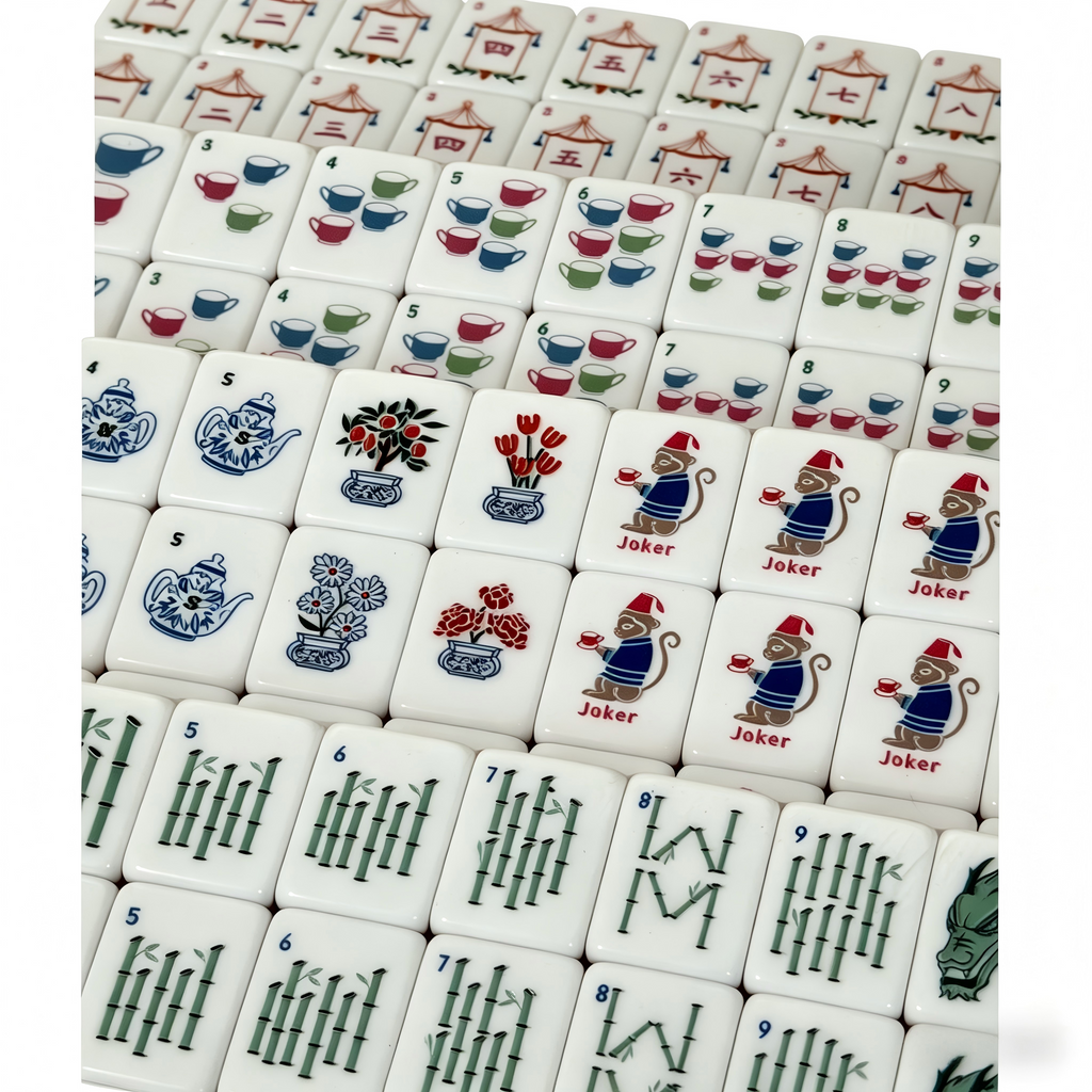 Detailed view of The Pink Peony American Mahjong Set by USA Mahjong Co. featuring vibrant pink acrylic tiles with gold inlays.
