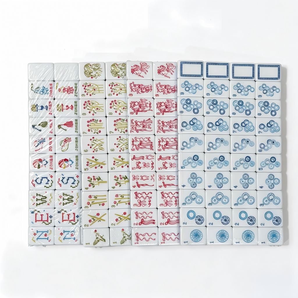 American Mahjong Set by USA Mahjong Co. with 166 linen-textured tiles featuring blue and white striped backs, including jokers and spares.