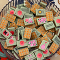 Jade Green Rattan Back Mahjong Tiles Mixed Shot - Sakura Flower, Red Lantern and Red Panda Tile Close Up