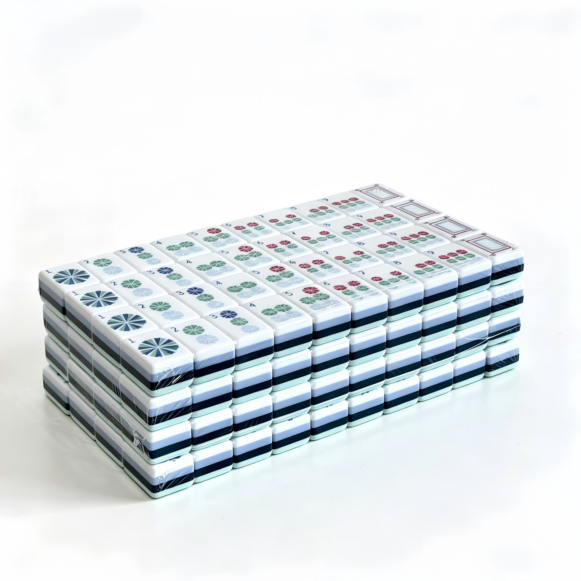 Side profile of 32g weighted Coastal Teal American Mahjong tiles by USA Mahjong Co., mint and azure design with whimsical monkey jokers.