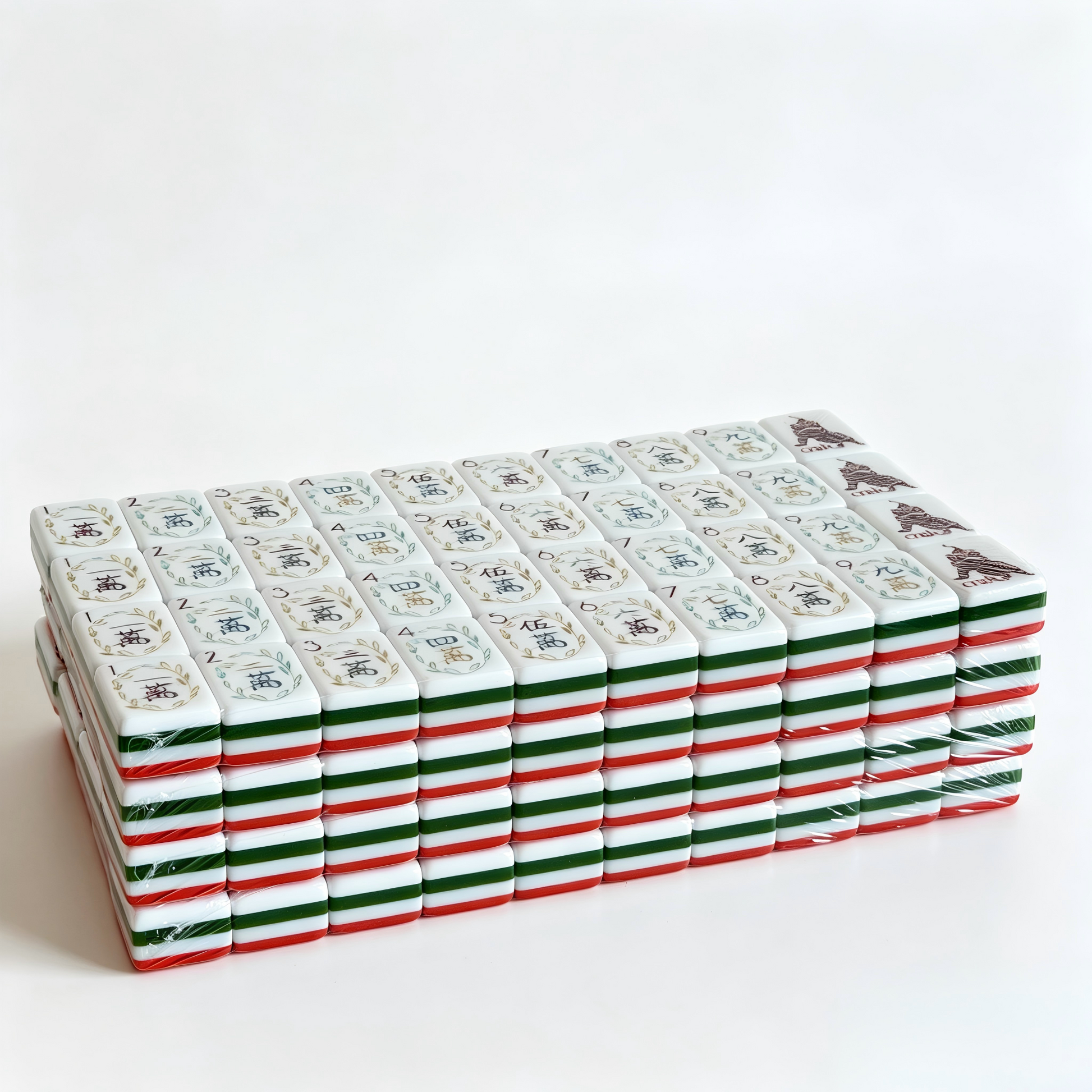 Side profile of 32g weighted Coral Reef American Mahjong tiles by USA Mahjong Co., showcasing vibrant coral red backs and professional aesthetic.