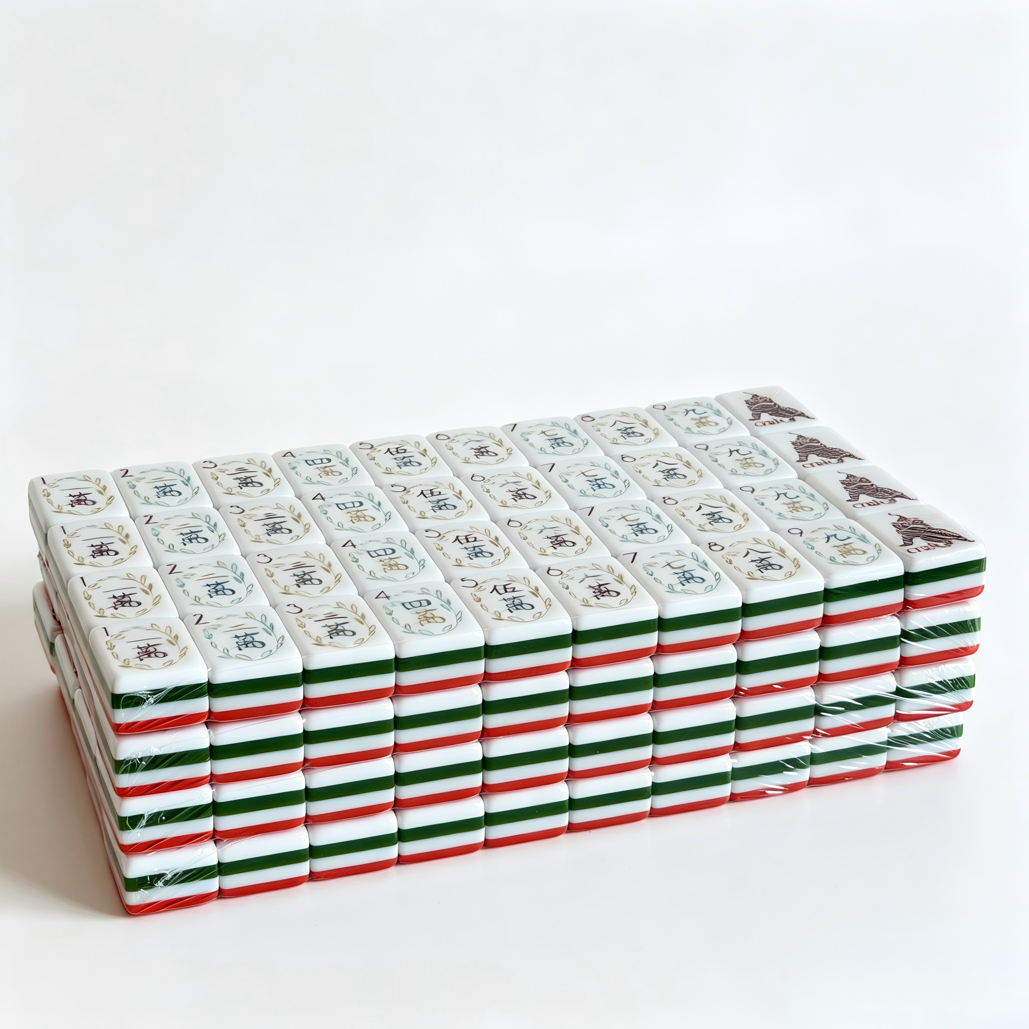 Side profile of 32g weighted Coral Reef American Mahjong tiles by USA Mahjong Co., showcasing vibrant coral red backs and professional aesthetic.