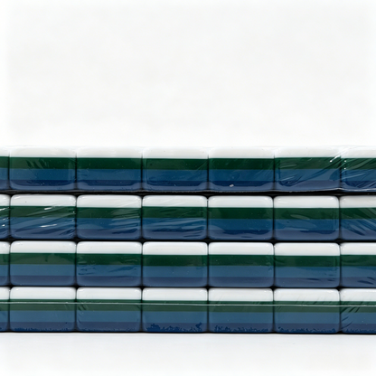 Side profile of 32g weighted teal Mahjong tiles with deep petrol backs from the USA Mahjong Co. American Mahjong Set.