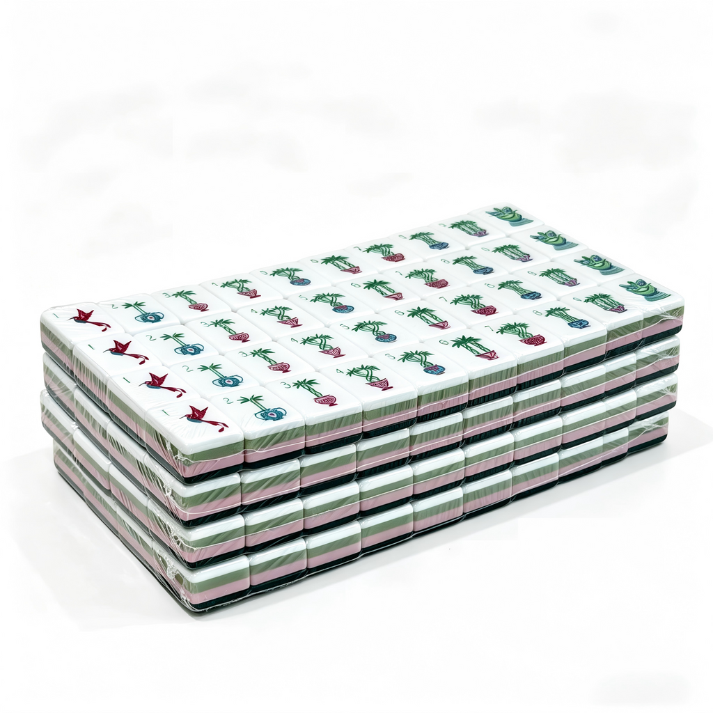 Side profile of 32g weighted Emerald Garden American Mahjong tiles by USA Mahjong Co., with translucent jade-green backs and detailed faces.