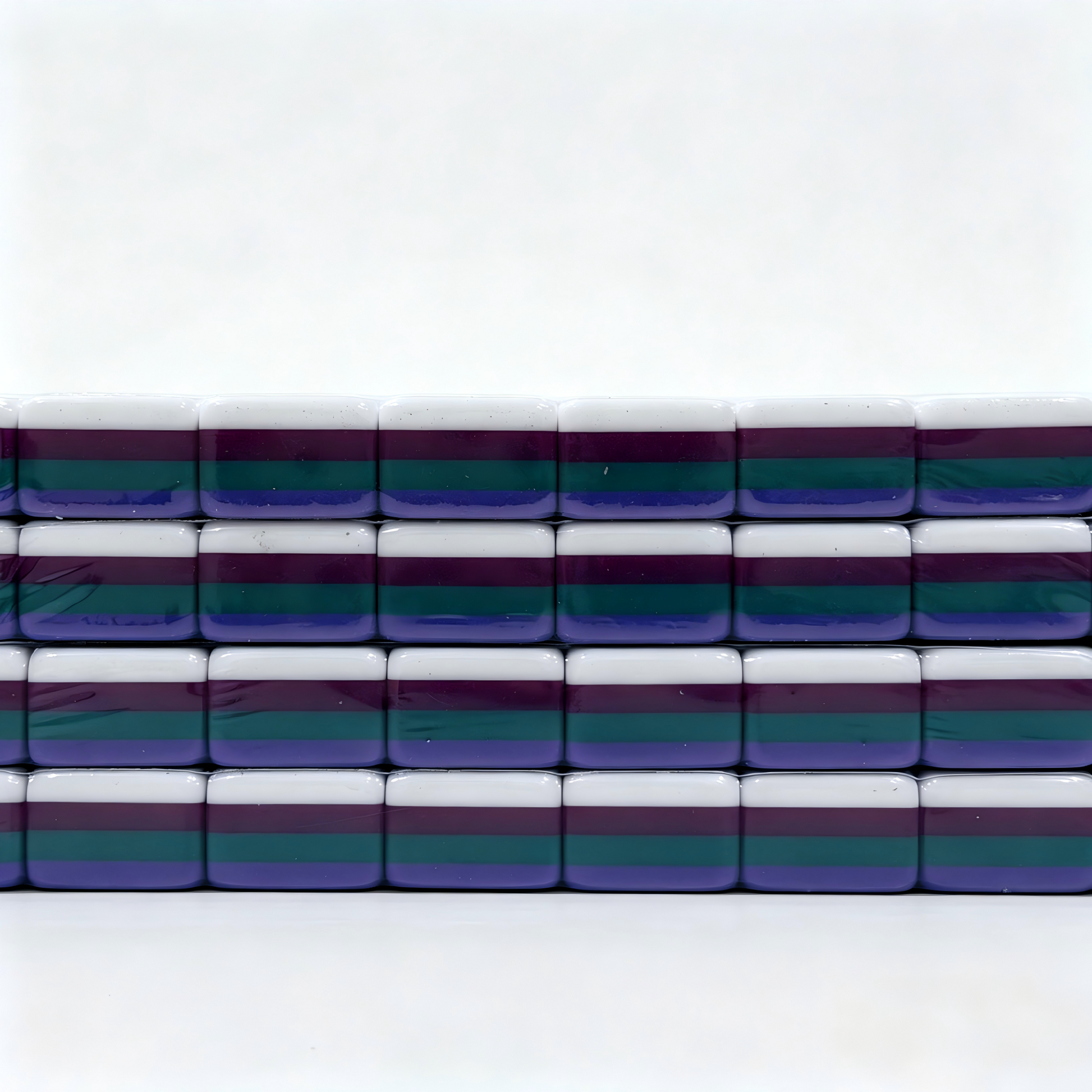 Side profile of 32g Galaxy Sparkle American Mahjong tiles with shimmering purple glitter backs, weighted for professional play.