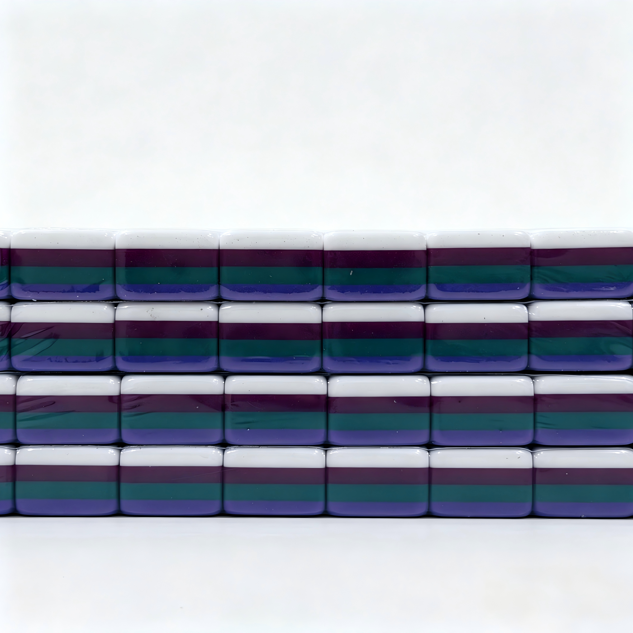 Side profile of 32g Galaxy Sparkle American Mahjong tiles with shimmering purple glitter backs, weighted for professional play.