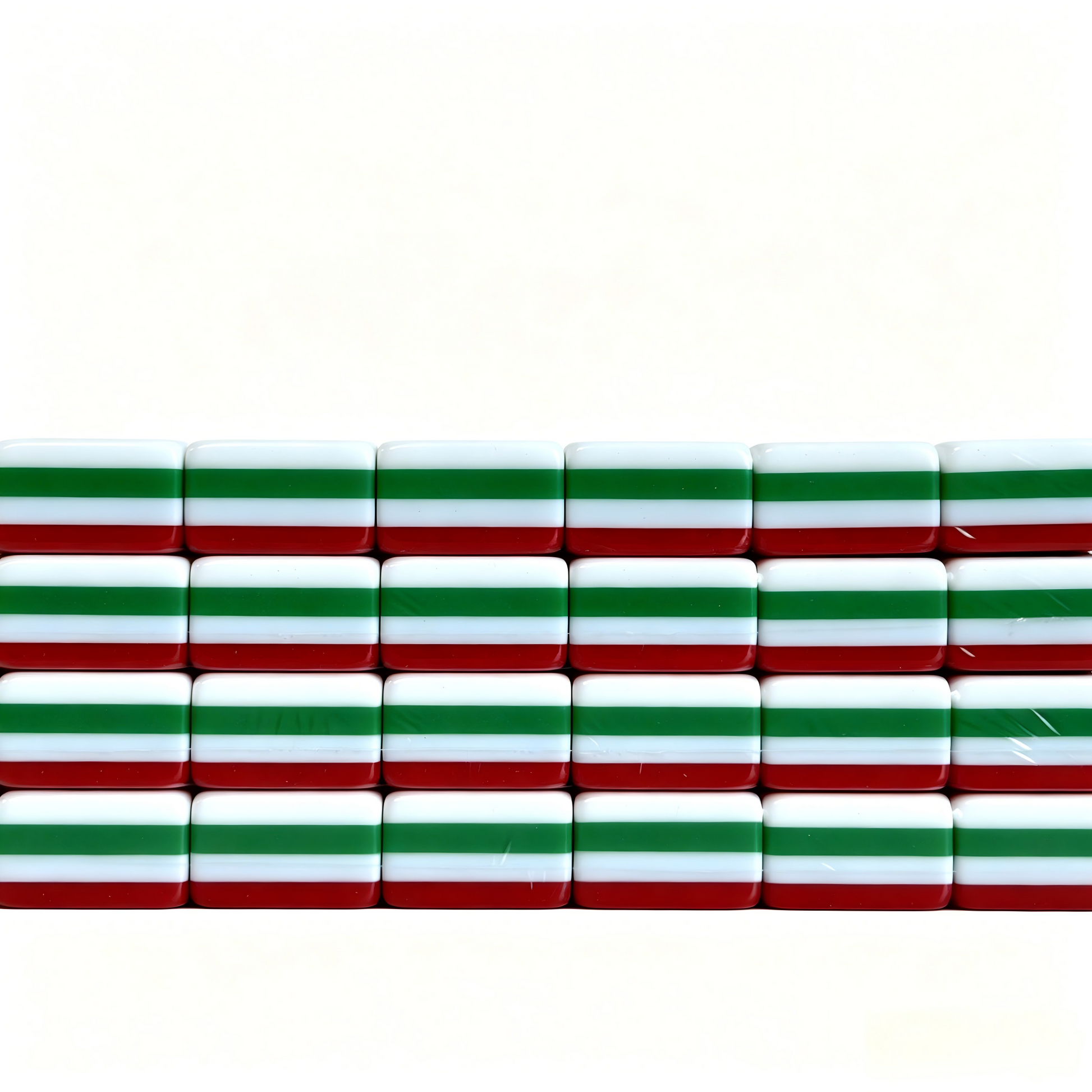 Side profile of 32g Scarlet Empress American Mahjong tiles by USA Mahjong Co., featuring weighted acrylic tiles with bold ruby red backs.