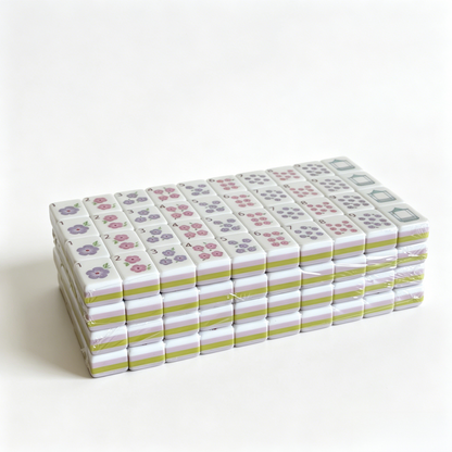 Side profile of Wisteria Bloom American Mahjong Set by USA Mahjong Co., 32g weighted tiles with soft lilac backs and purple aesthetic.