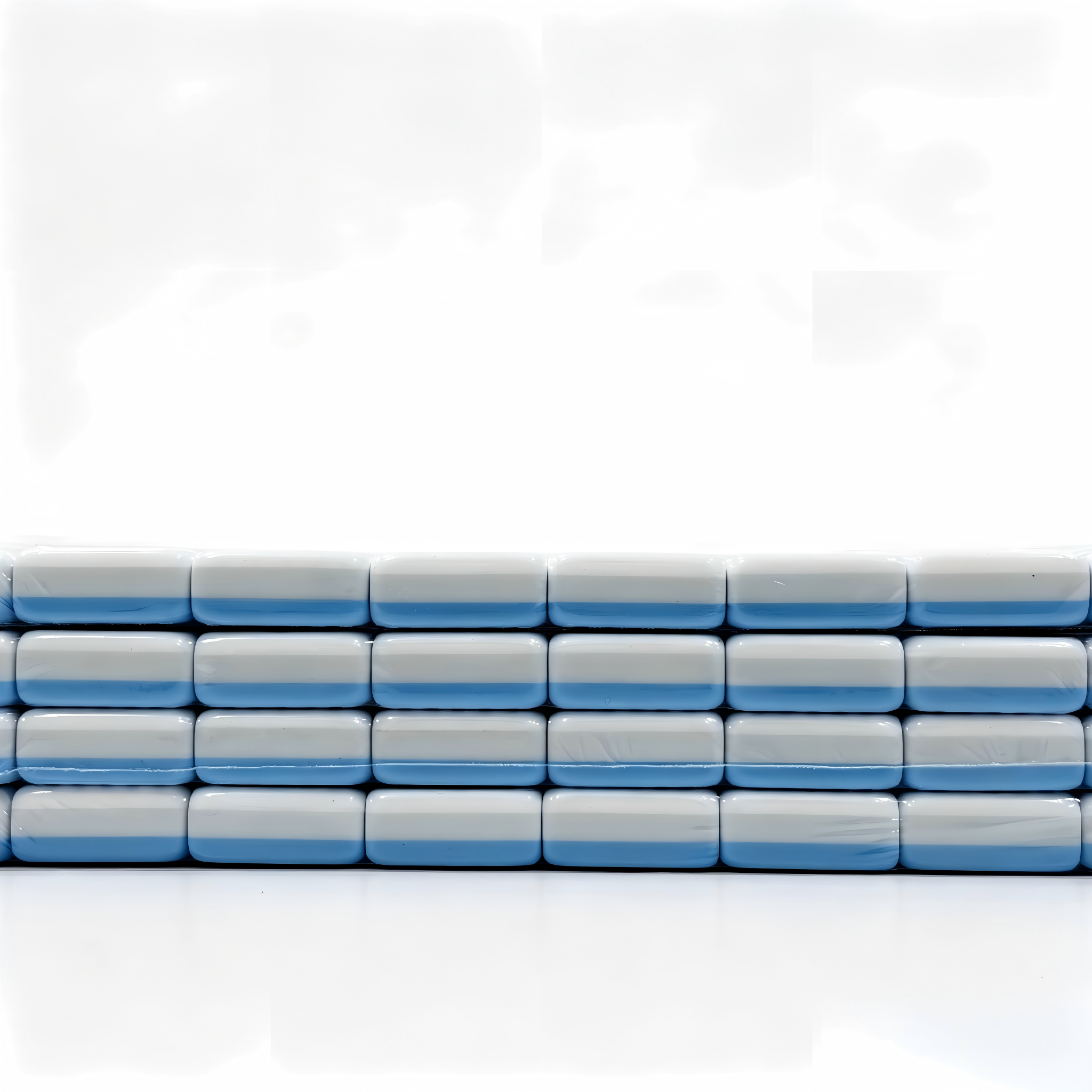 Side view of 32g blue-striped tiles from The Sky Linen American Mahjong Set by USA Mahjong Co., featuring weighted, professional-quality tiles.