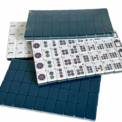 Teal Zenith American Mahjong Set by USA Mahjong Co. with 166 weighted tiles, deep petrol blue backs, and compass wind design.