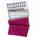 American Mahjong Set with 166 weighted tiles featuring deep magenta backs and playful candy design by USA Mahjong Co.