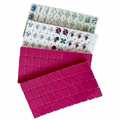 Modern American Mahjong Set by USA Mahjong Co. featuring 166 weighted tiles with vibrant fuchsia backs and intricate designs.