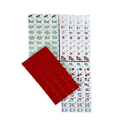 American Mahjong Set by USA Mahjong Co. with 166 weighted acrylic tiles featuring bold ruby red backs and marbled designs.