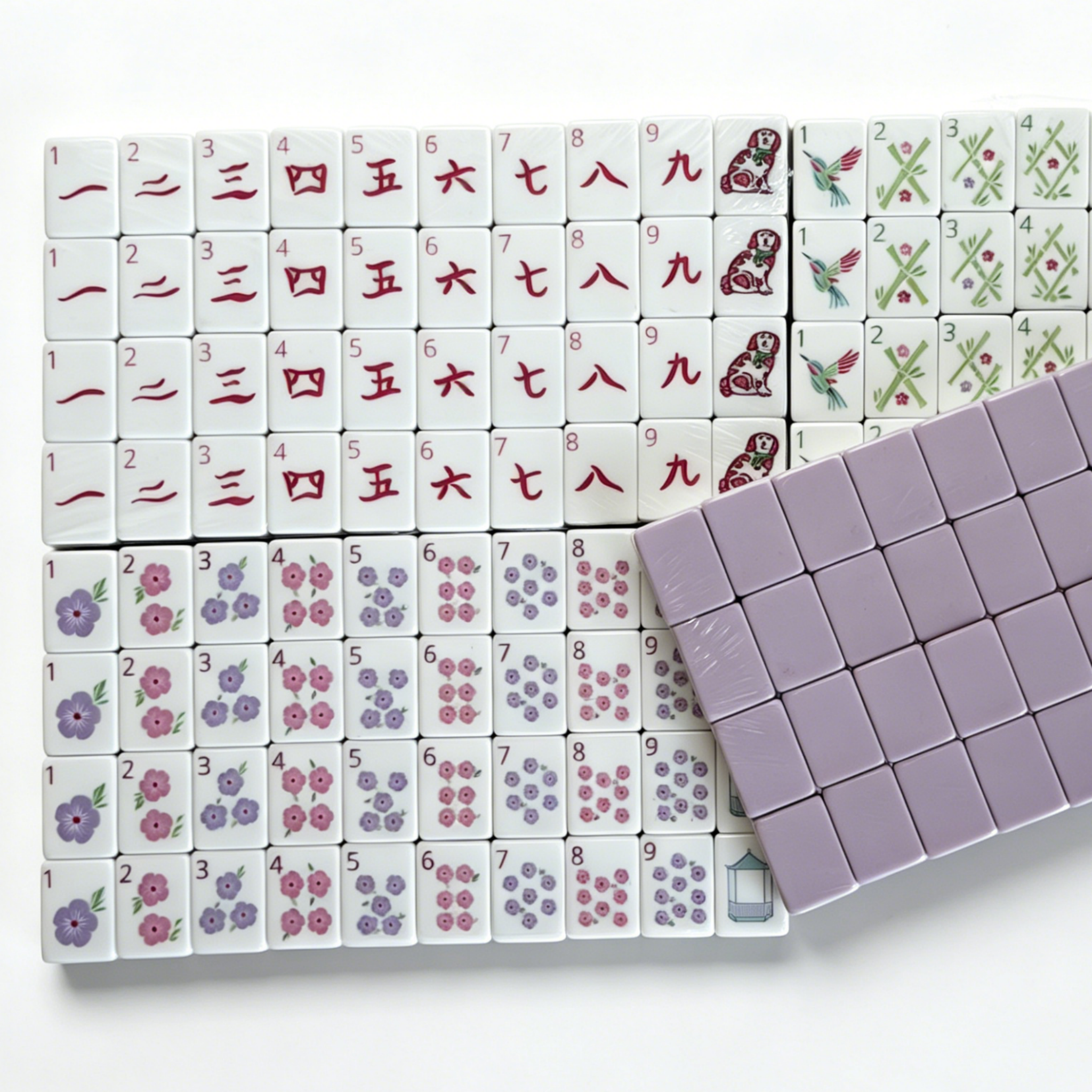 Modern American Mahjong Set by USA Mahjong Co. featuring 166 lavender-colored weighted tiles with soft lilac backs.