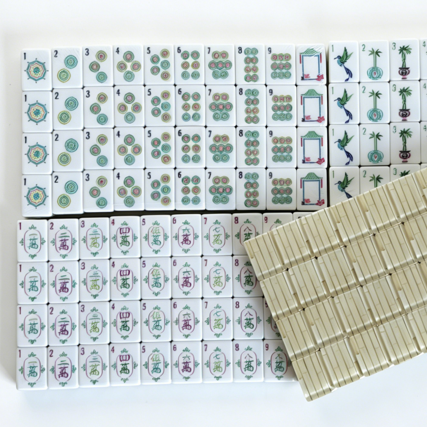 American Mahjong set by USA Mahjong Co. with 166 textured ivory-backed tiles, including 8 jokers and 4 spares in Zen Bamboo design.