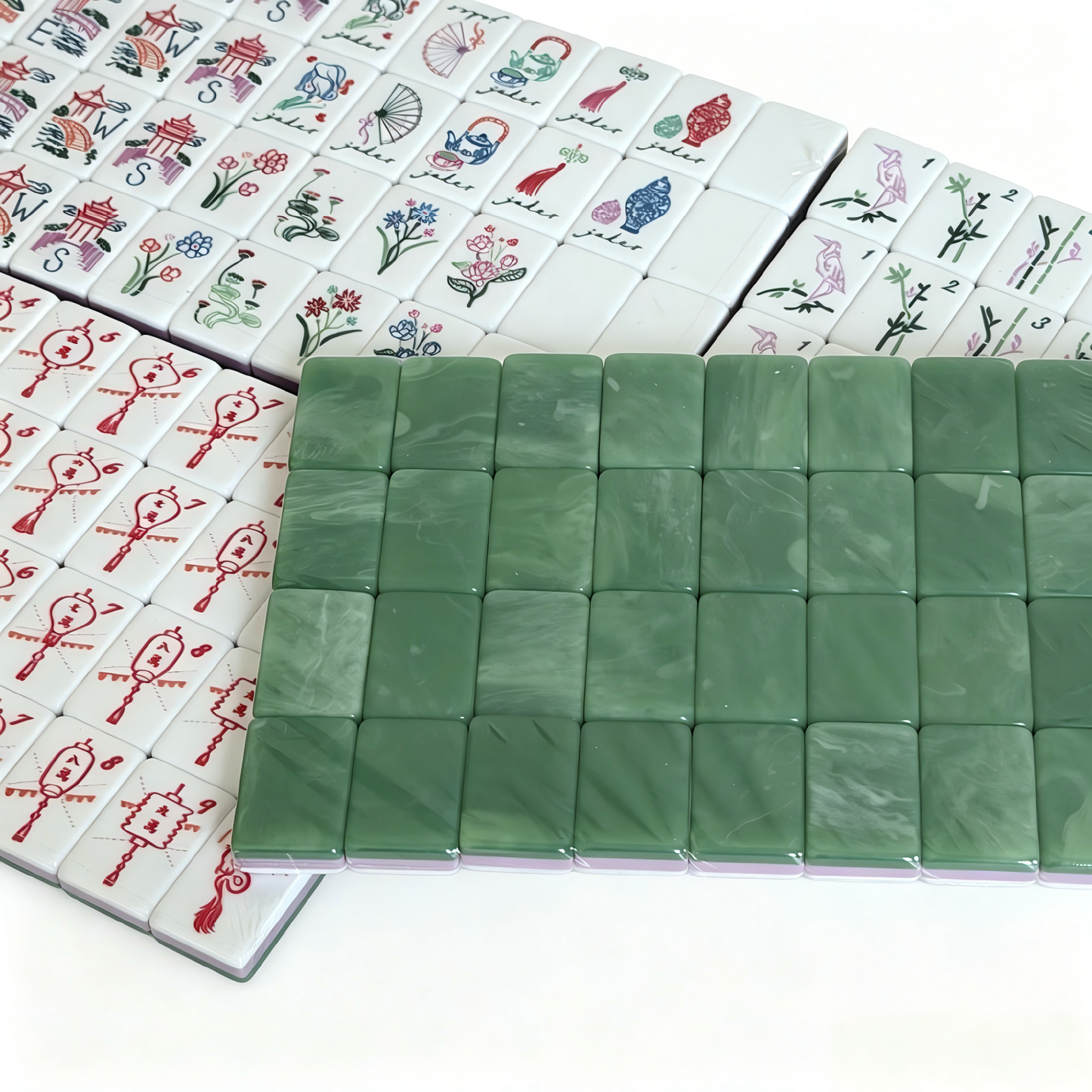 Translucent light green acrylic Mahjong tiles with gold inlays from The Jade Lantern Heritage American Mahjong Set by USA Mahjong Co.